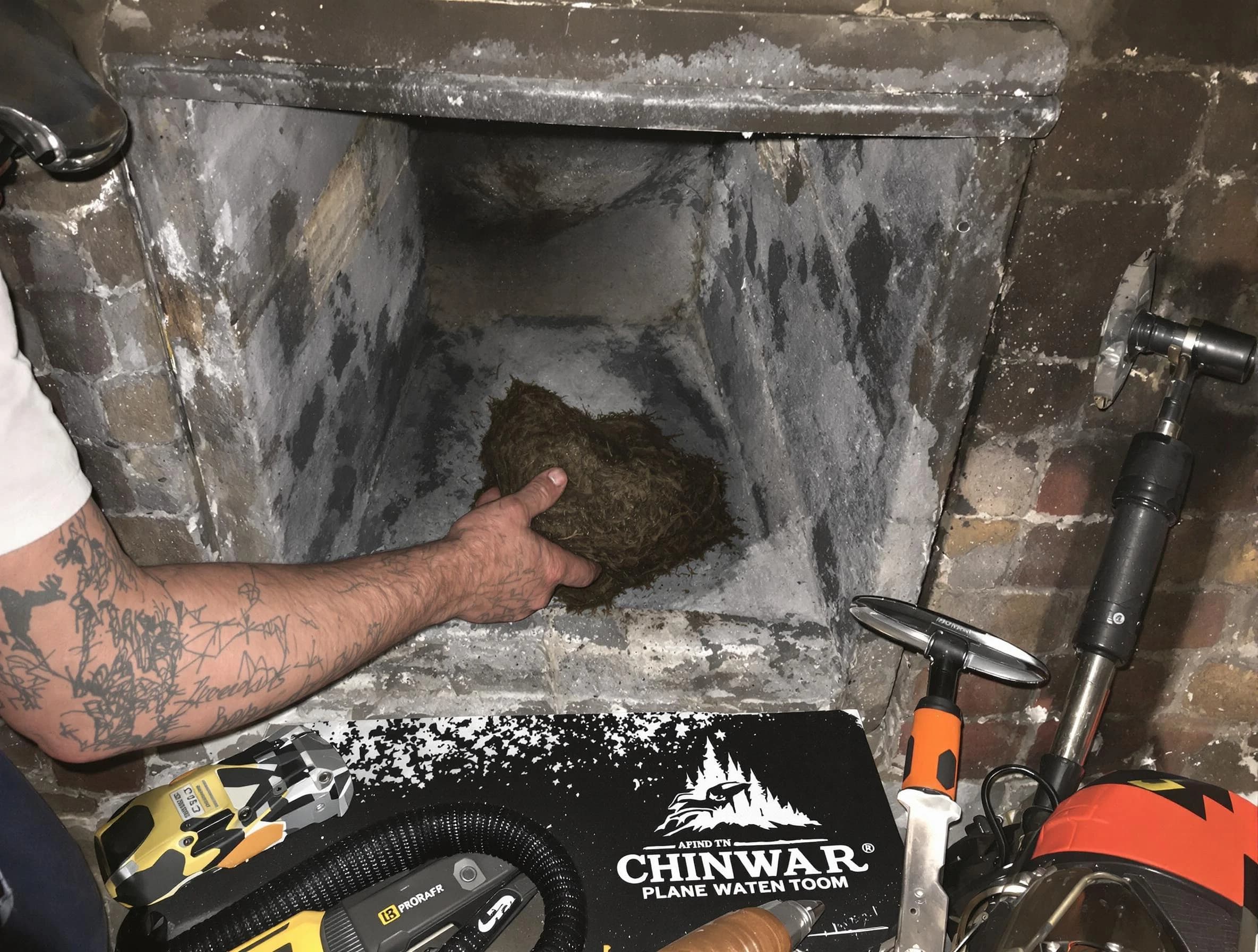 Montville Chimney Sweep safely removing debris and screening chimney in Montville, NJ